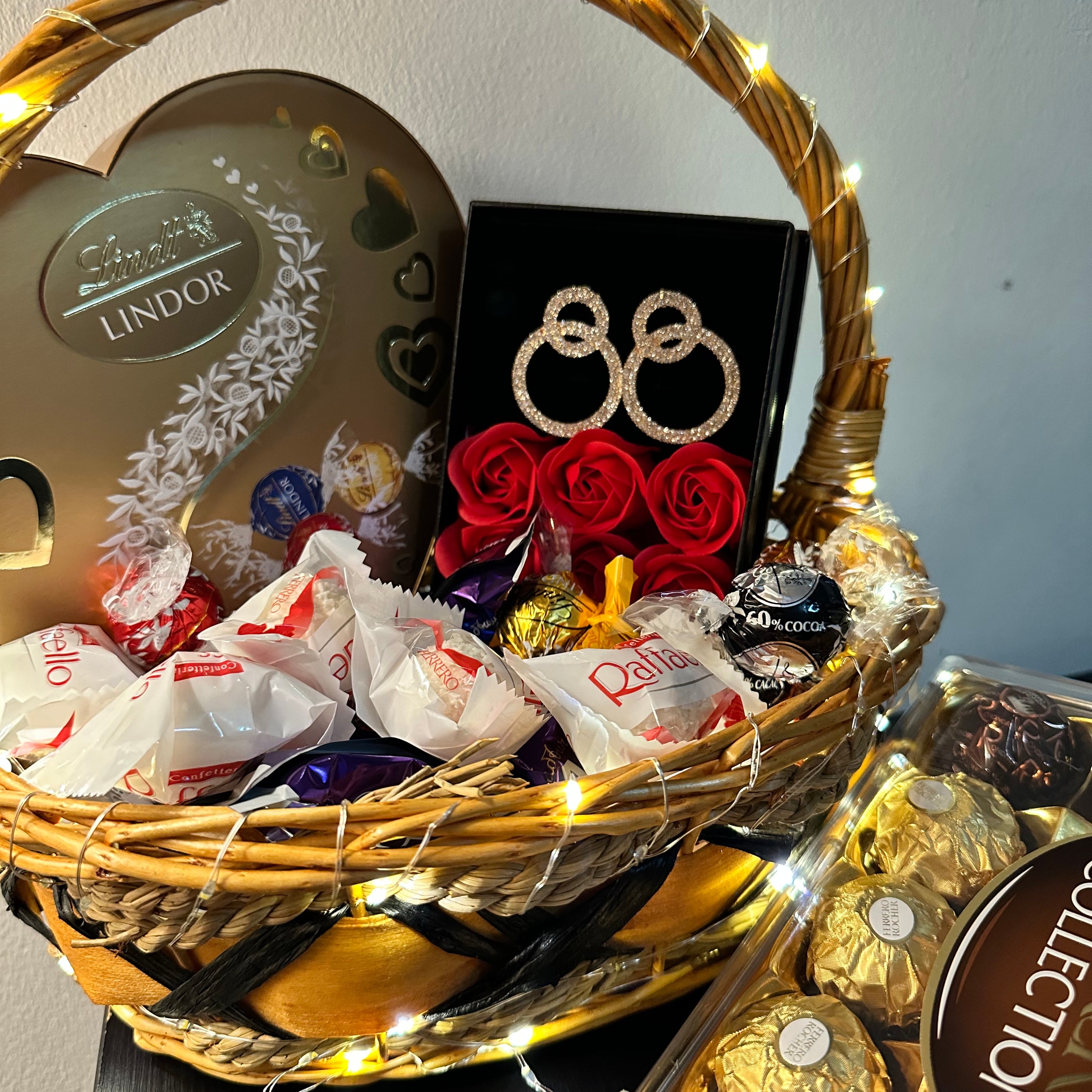 Valentine's Bliss Bucket: A Symphony of Sweets, Chocolates, Dazzling Earrings, and LED Elegance - A Perfect Gift of Love